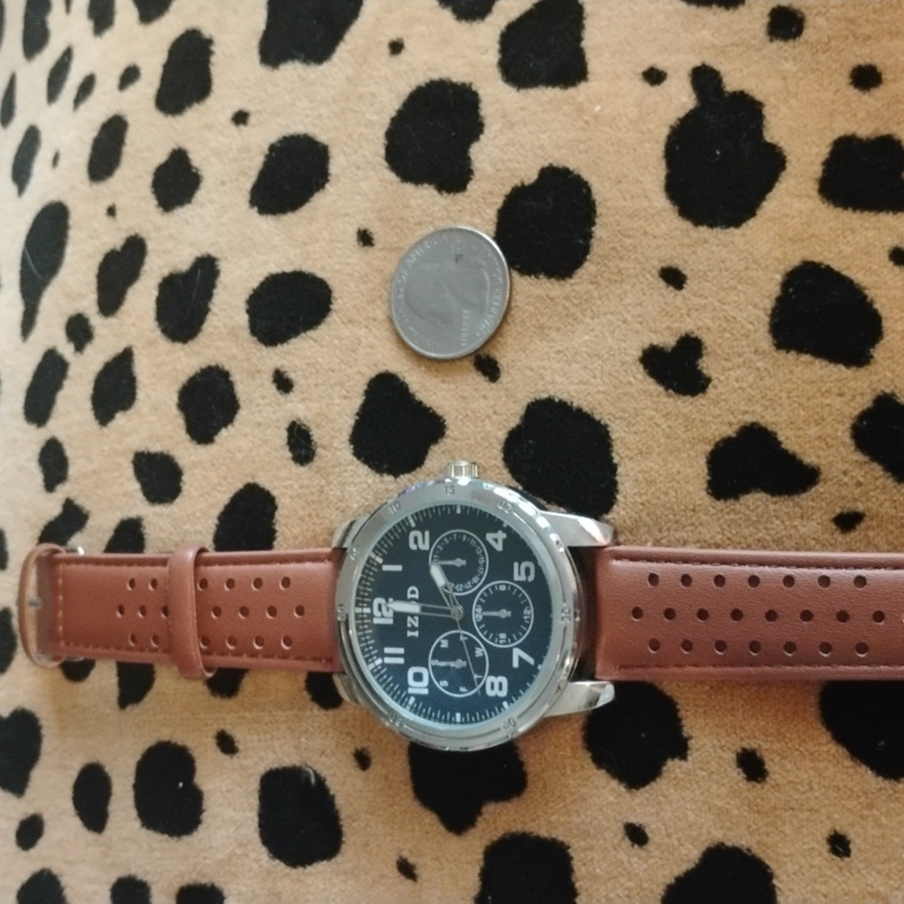 Izod brand watch with perforated brown leather band